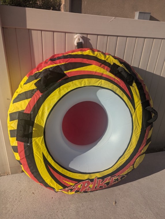 Heavy-duty towable river tube with cover